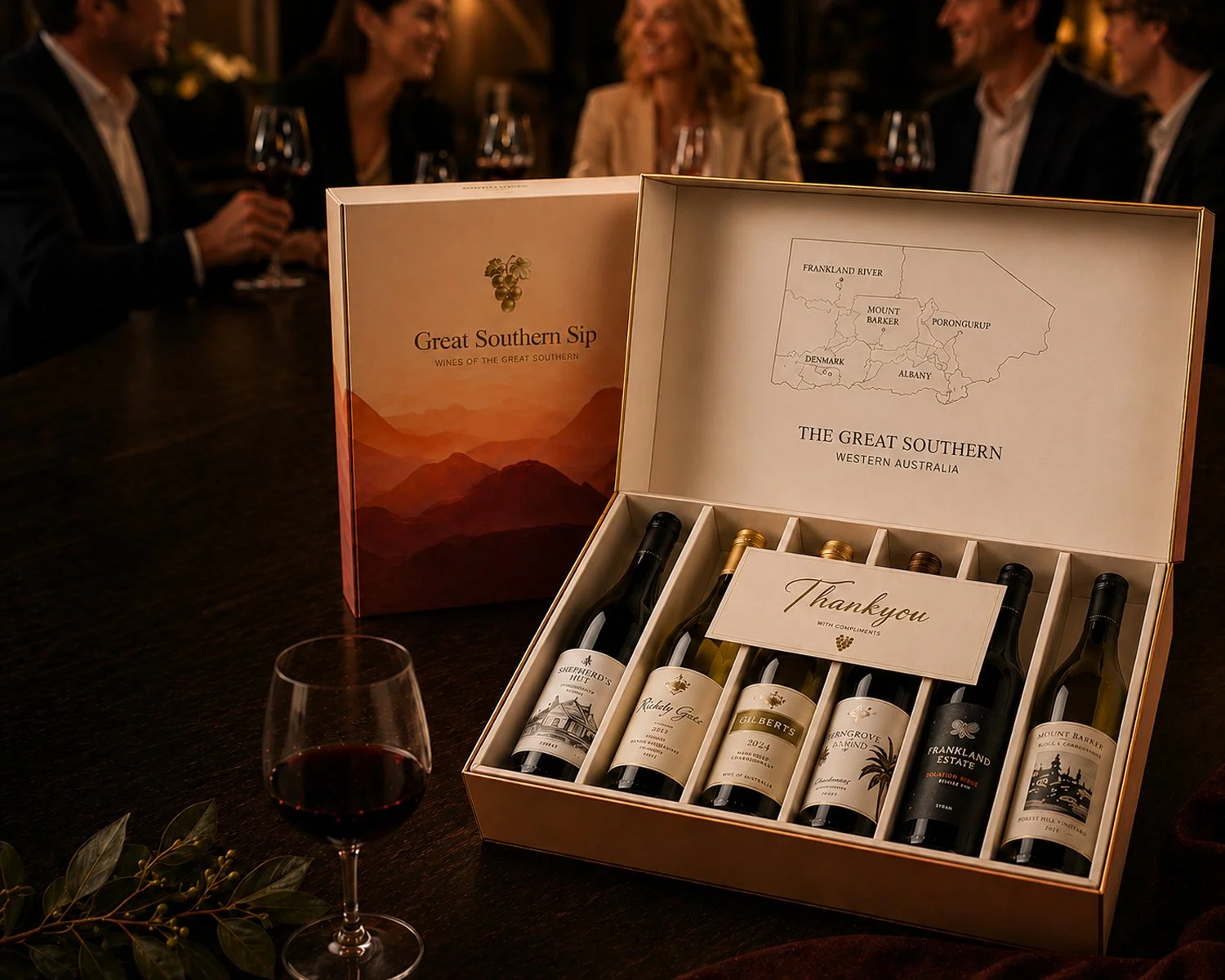 Great Southern Sip wine gift box and printed materials displayed during a corporate tasting.