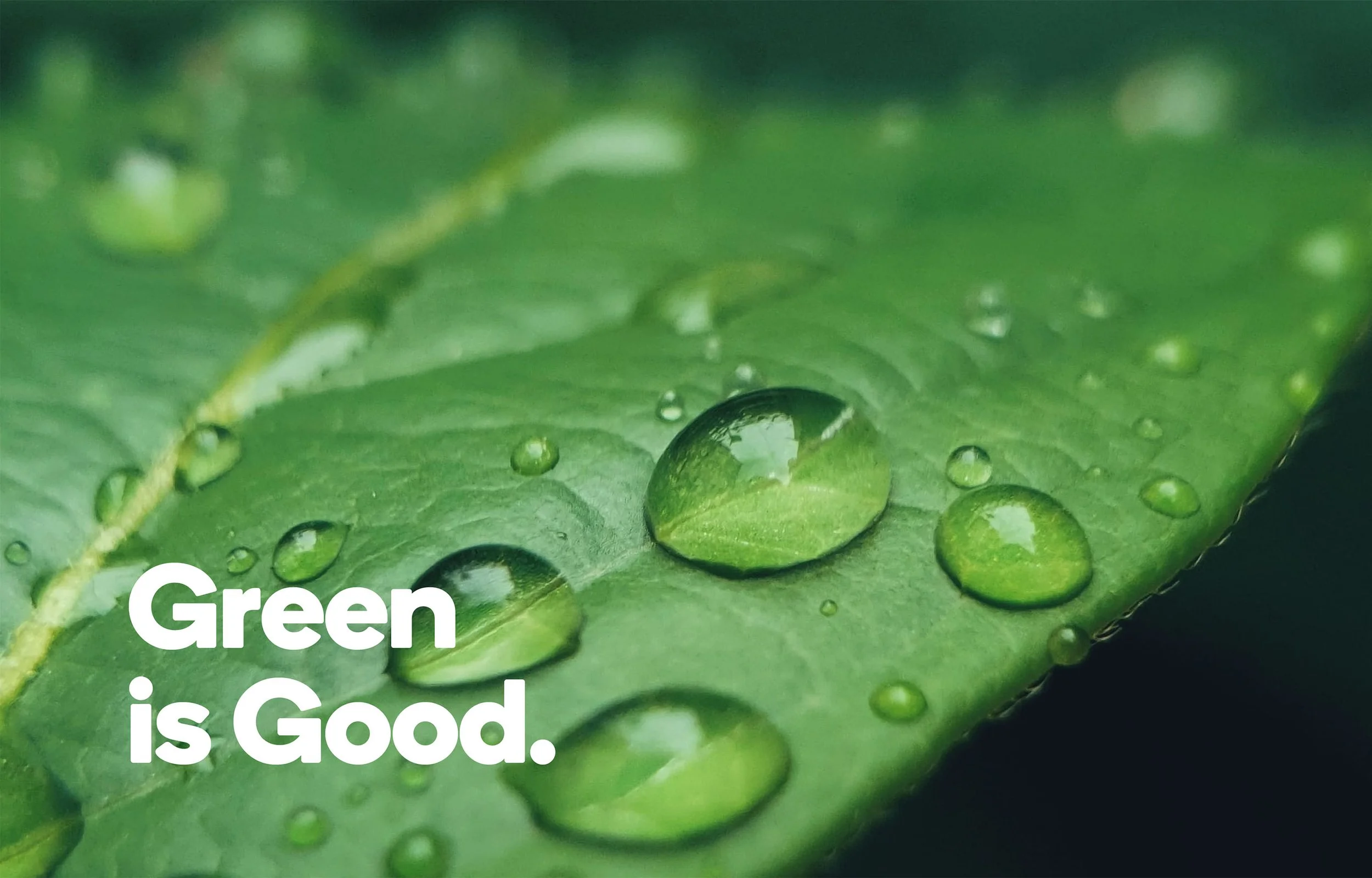 Green is Good slogan on leaf.
