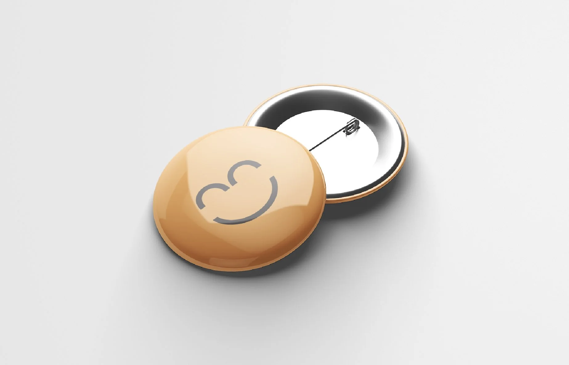 Photo of a Love Mondays labelled pin.