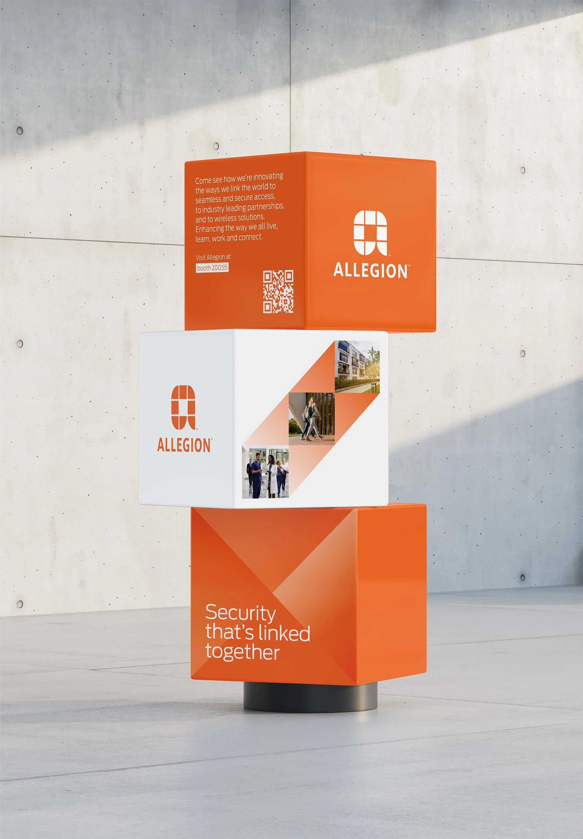 Three stacked rectangular promotional display blocks for Allegion, featuring company logo, informational text, images of buildings and people, and tagline 'Security that's linked together', set against a concrete wall background.