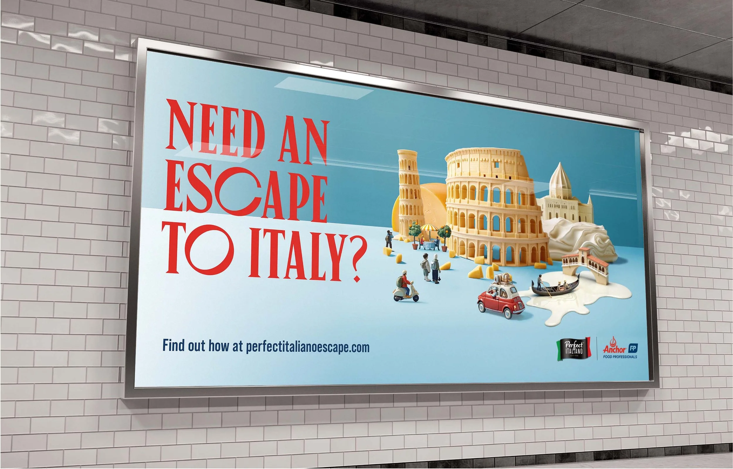 An advertisement on a wall with the text: 'Need an Escape to Italy?' featuring models of famous Italian landmarks like the Leaning Tower of Pisa, Roman Colosseum, and St. Peter's Basilica. There are also small model vehicles and tourists, with icons for Perfect Italiano and Anchor Food Professionals logos at the bottom.