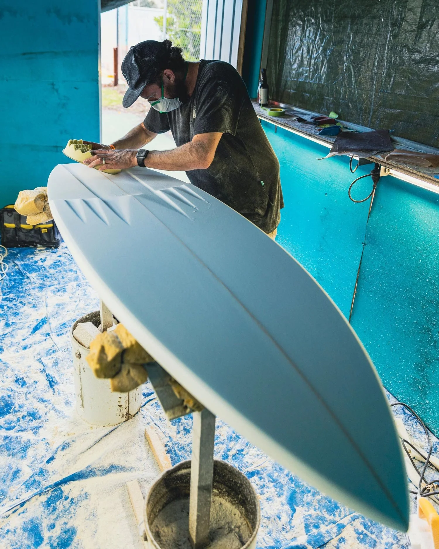 handshaping a surfboard with channels at the Bicheno Food and Wine Festival with Aquiva and Vissla Shapers Shack
