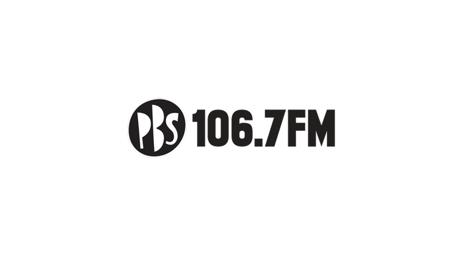 Logo of PSS 106.7 FM radio station on a black background.