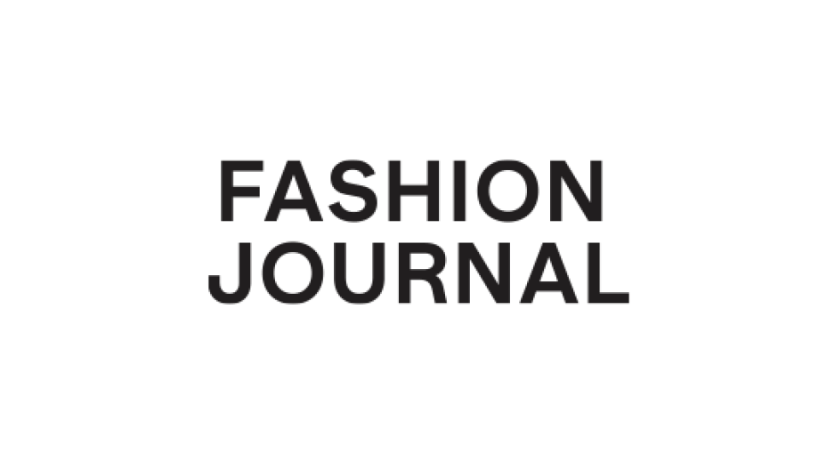 A black and white logo with the words "FASHION JOURNAL" in bold uppercase letters.