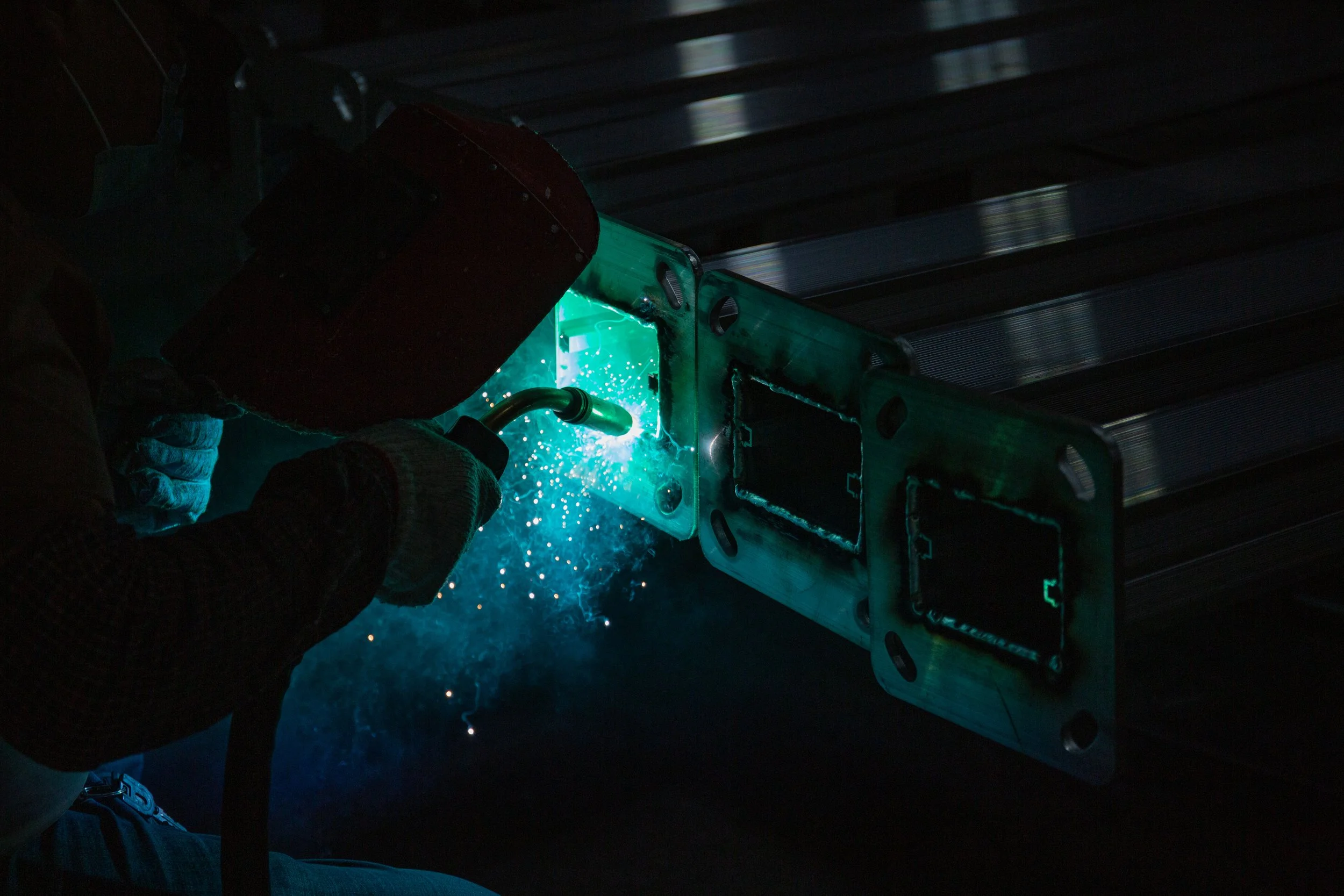 In-House Production · Quality Control From The Source
Full visibility of lighting metal parts welding and processing.