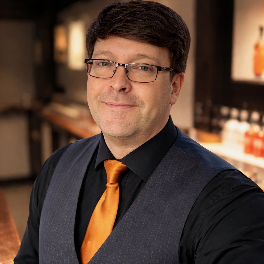 Richard McGrady-Brake, founder and operator of Willow & Stone Hospitality, behind the bar at Hensol Castle.