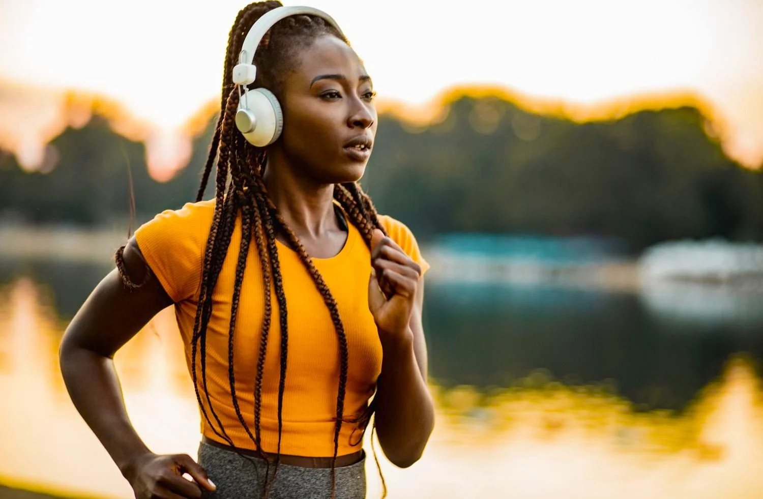 A woman jogging down the road