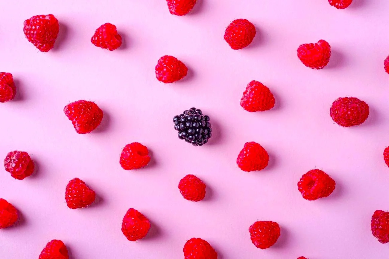 Image of berries on a pink background