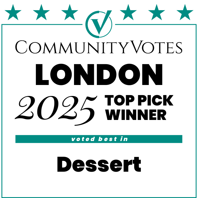 A sign recognizing a community votes award in London for 2025, indicating the top pick winner in the dessert category.