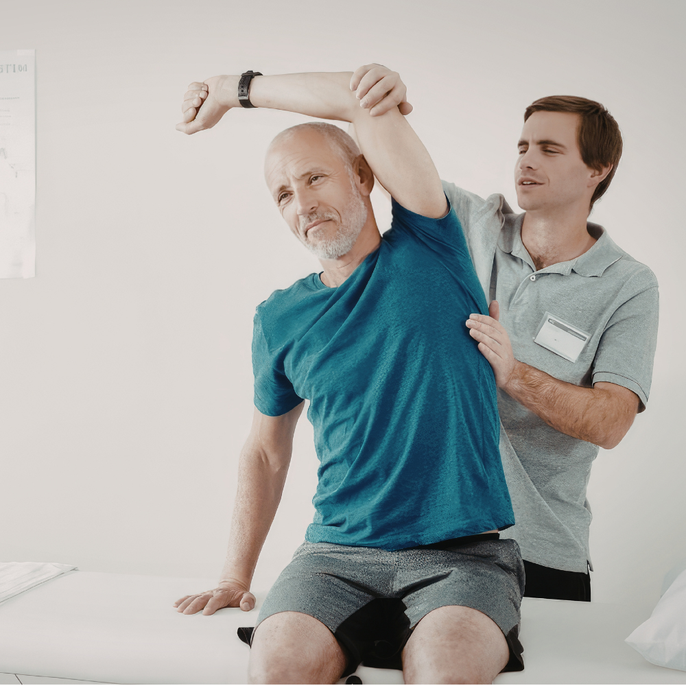 A physical therapist assisting an older man with shoulder stretching exercises in a medical setting.