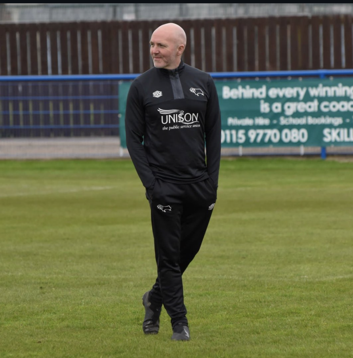 Simon Brundish sports scientist and performance coach working on a football pitch at Derby County