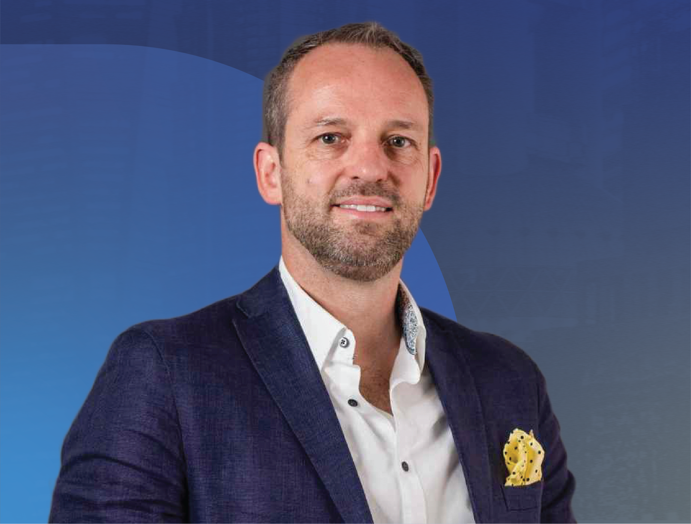 Professional portrait of Professor Robert Riener in a dark blazer and white shirt with a yellow pocket square against a blue abstract background.