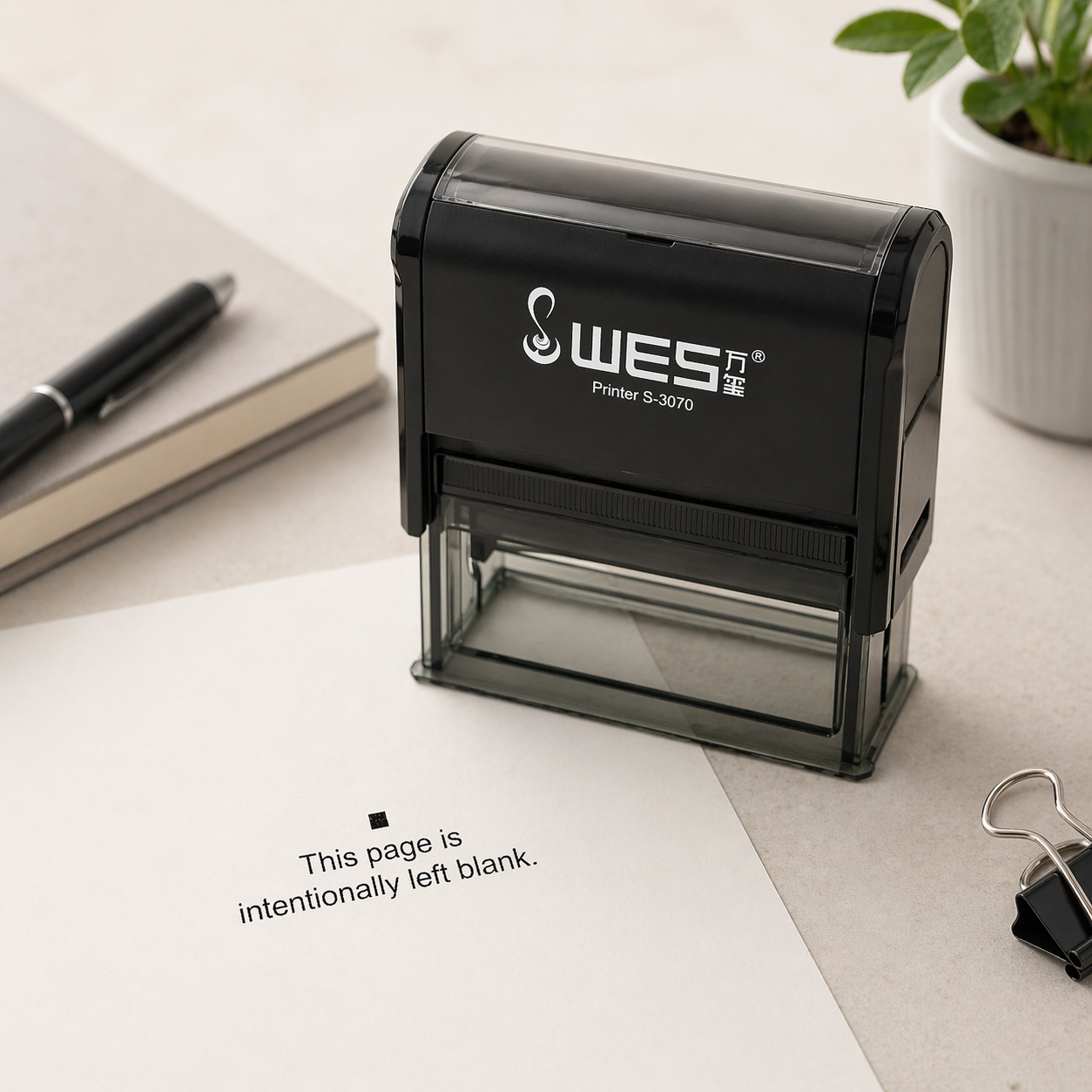 This page is intentionally left blank stamp.png