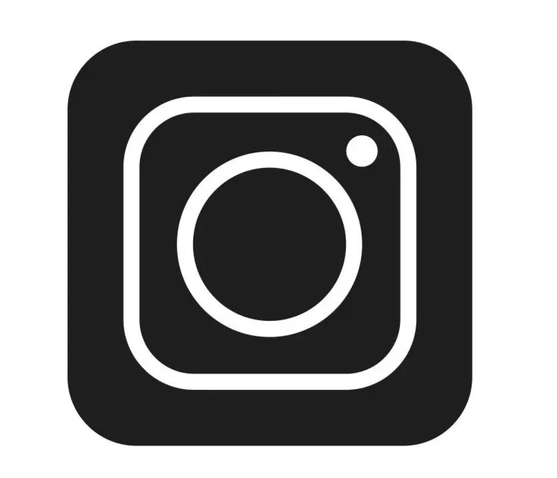 A black and white icon of a camera, representing Instagram.
