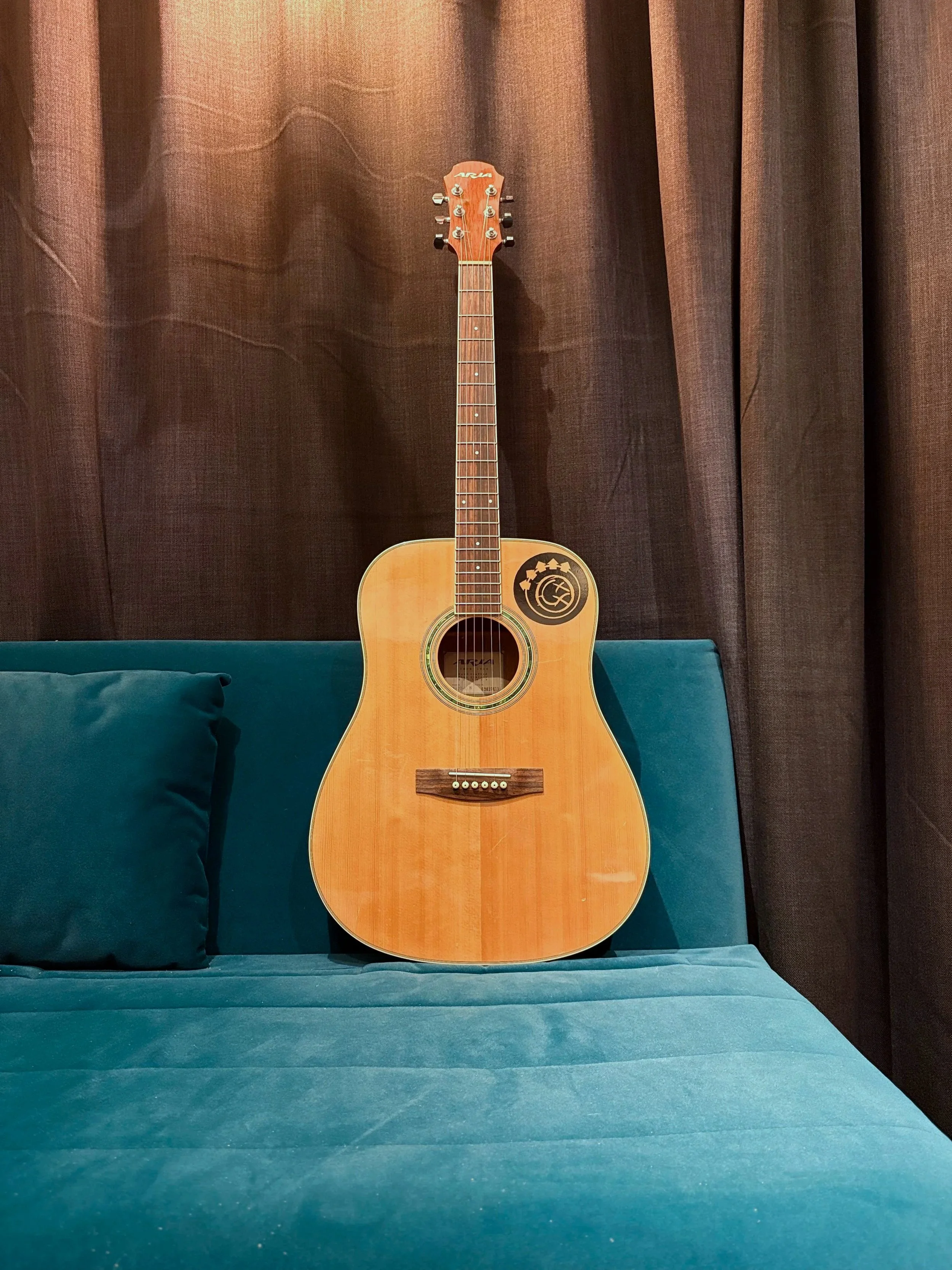 A nice Aria Acoustic which has Nashville tuning, to create those 12 string layers.