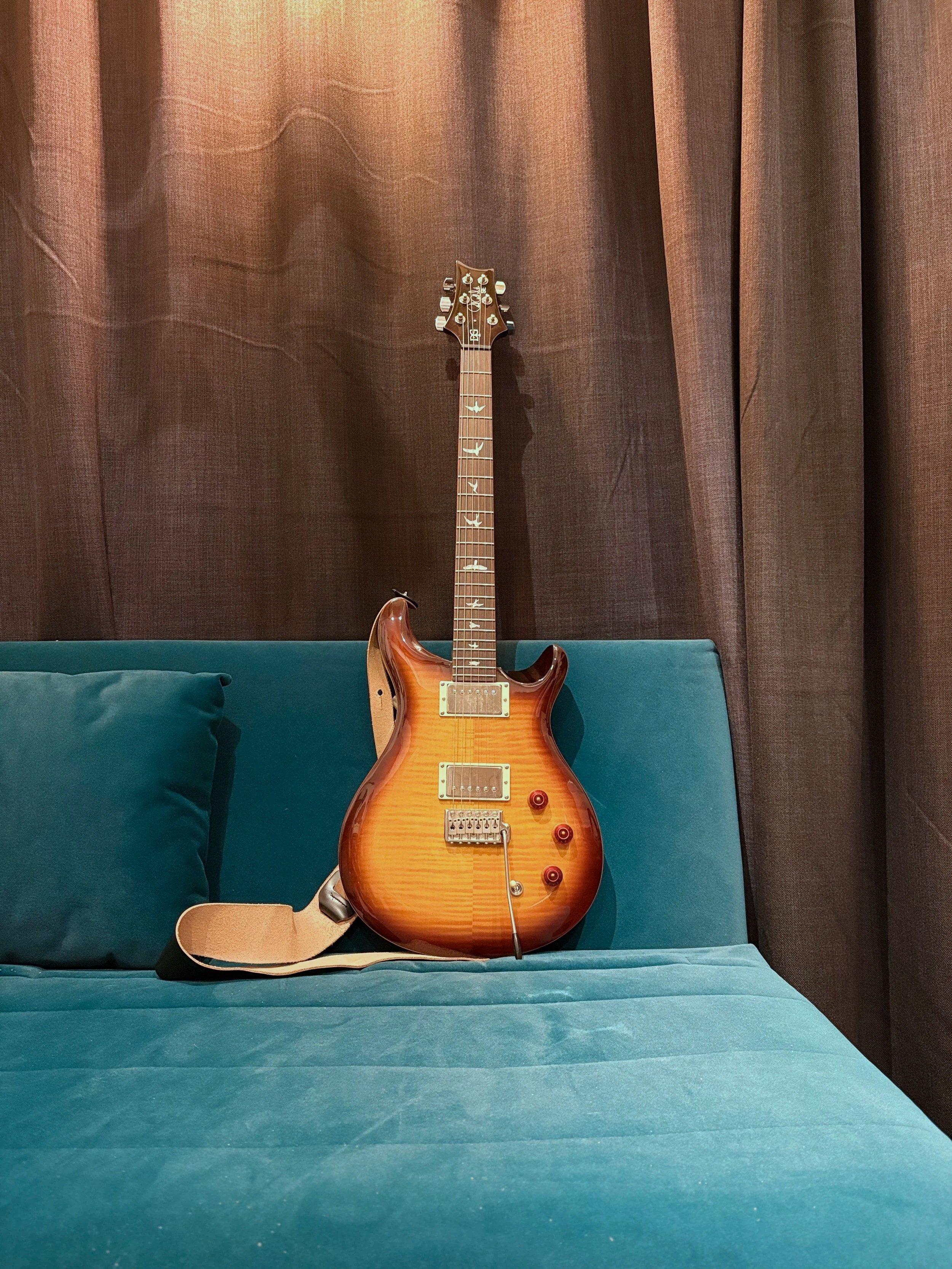 PRS SE Dave Grissom. An amazing player, and the guitar is pretty good too.