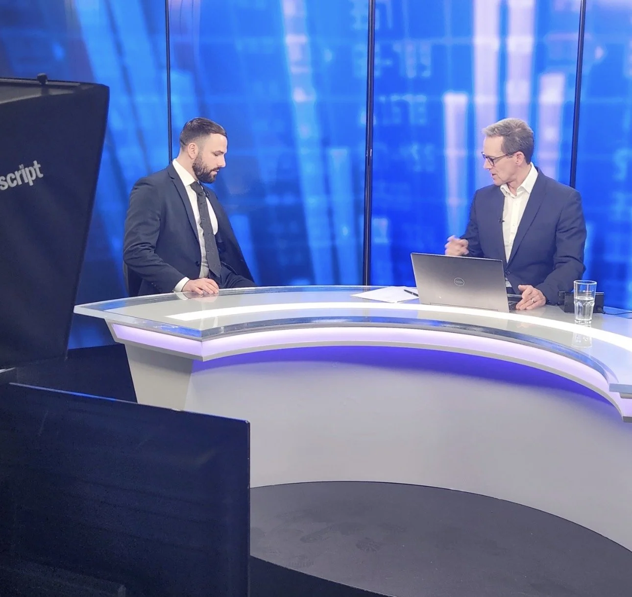 Cameron Papoulias appearing on a financial news segment, sharing insights on markets, investing, and wealth management.