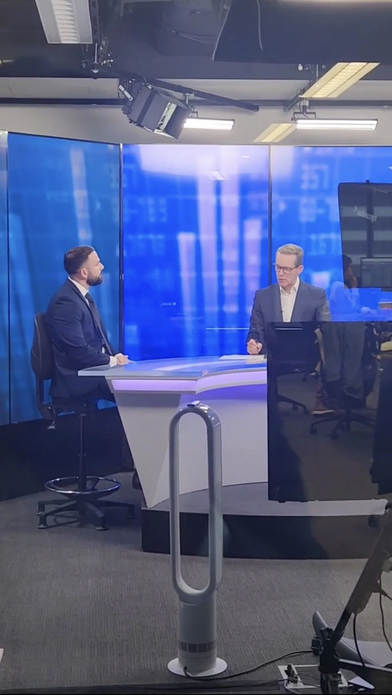 Cameron Papoulias appearing on a professional financial news broadcast in Sydney, providing insights on global markets, portfolio strategy, and long-term wealth management for high-net-worth individuals and institutions.