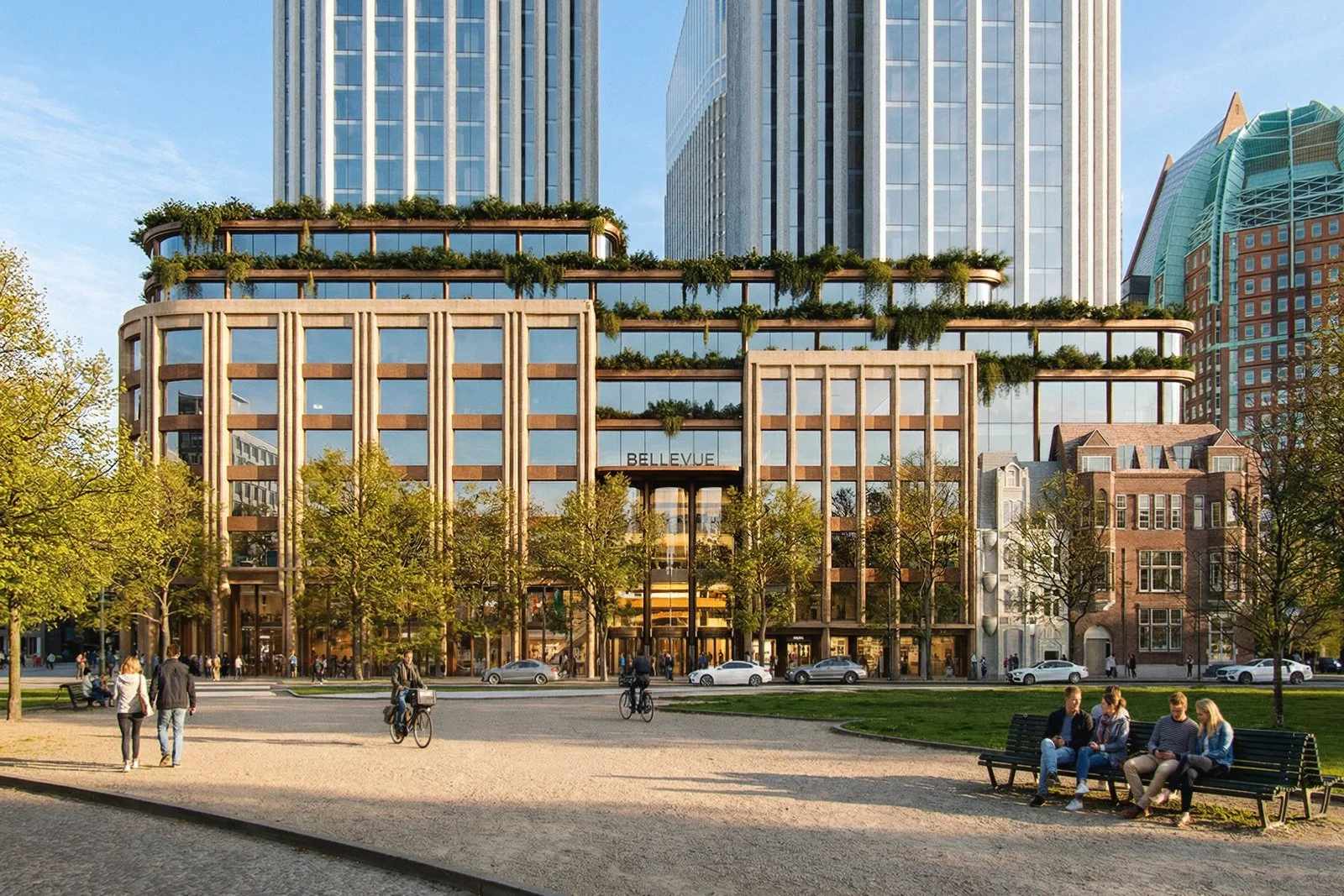 A city park featuring a modern building labeled Bellevue with trees, benches, pedestrians, and people on bicycles, with tall skyscrapers in the background.