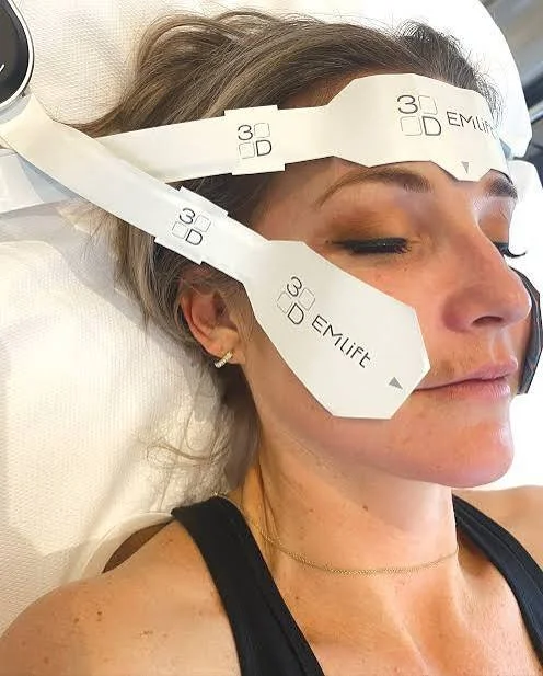 Client receiving an EMLift facial treatment at Elizabeth M’s Edinburgh skin studio