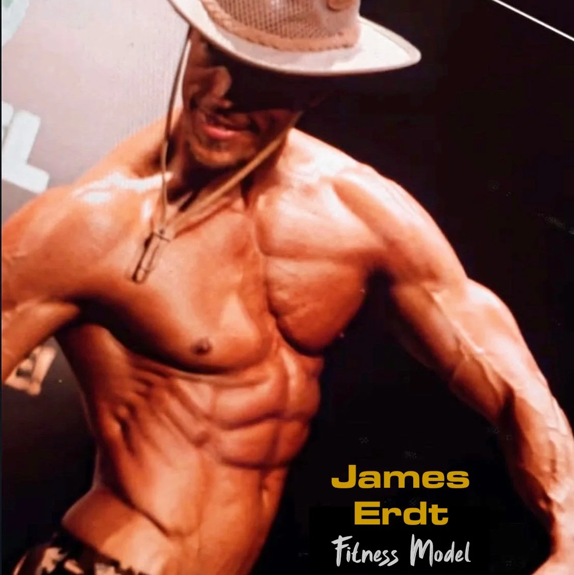 A shirtless male fitness model wearing a hat and sunglasses, flexing his muscles, with the text "James Erdt Fitness Model" at the bottom.