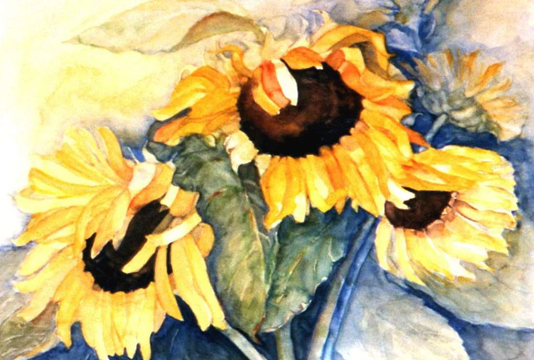 A watercolor painting of three sunflowers with yellow petals and dark centers, accompanied by green leaves.