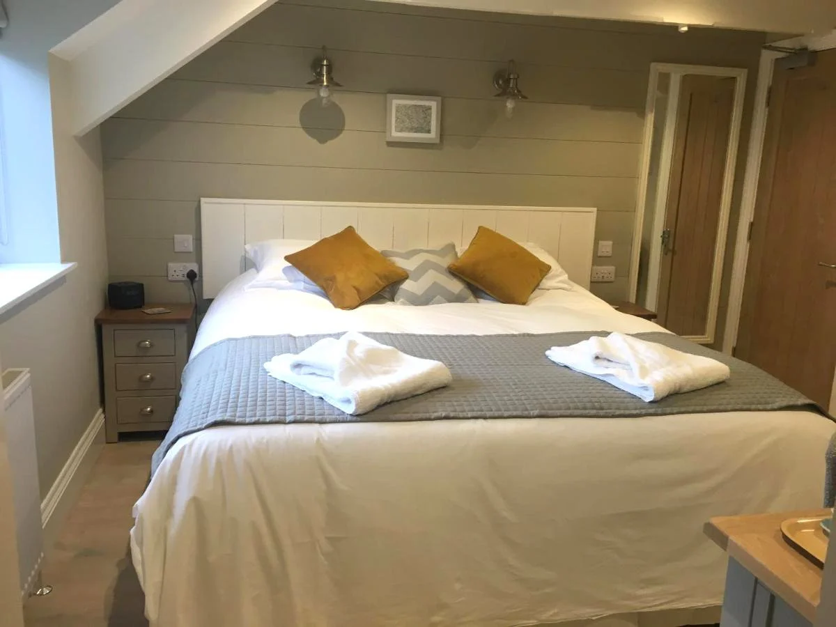 Super king river view bedroom at The Galleon Inn, Fowey