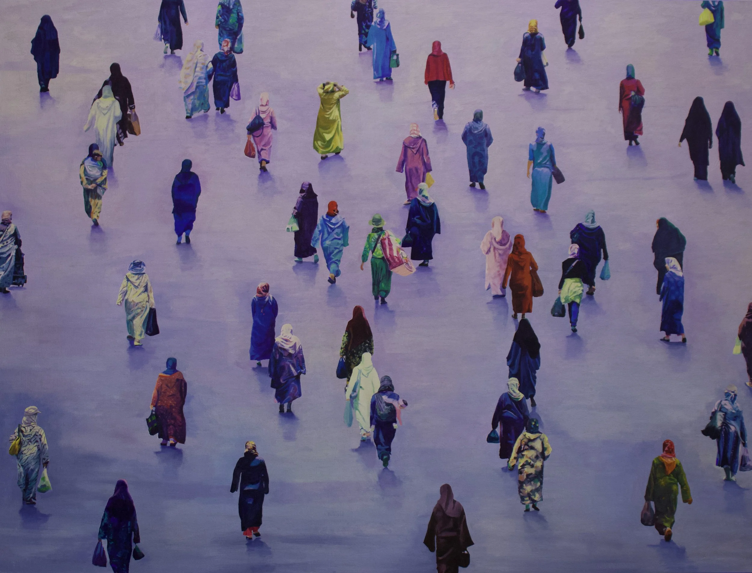 Numerous women walking across a large, open space that appears to be a plaza or an open-air market, with their backs facing the camera. The people are dressed in colorful clothing, and the ground has a purple hue.