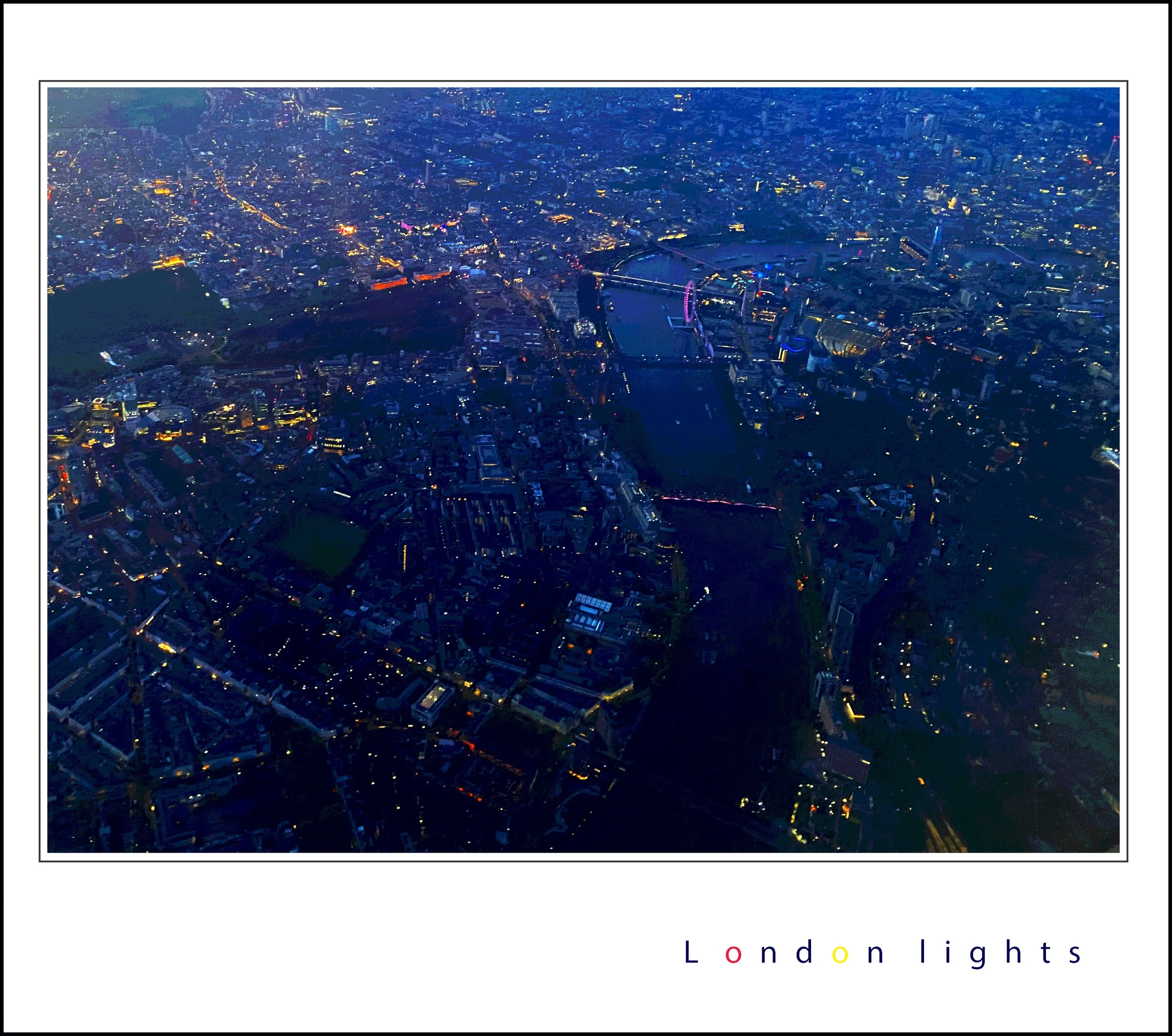An aerial view of London at night with city lights illuminating the skyline and the River Thames visible. The text 'London lights' is written at the bottom of the image with each letter in different colors.