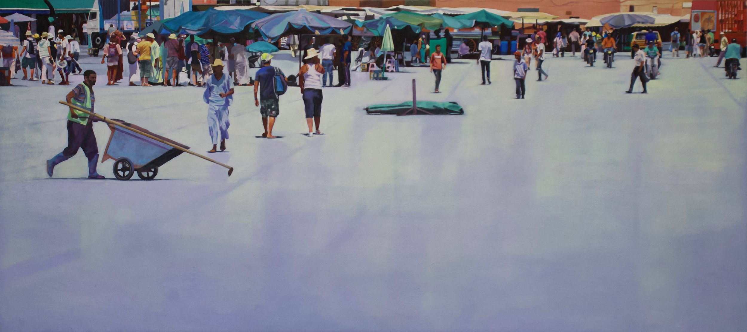 People walking and browsing market stalls under umbrellas at a busy outdoor market.