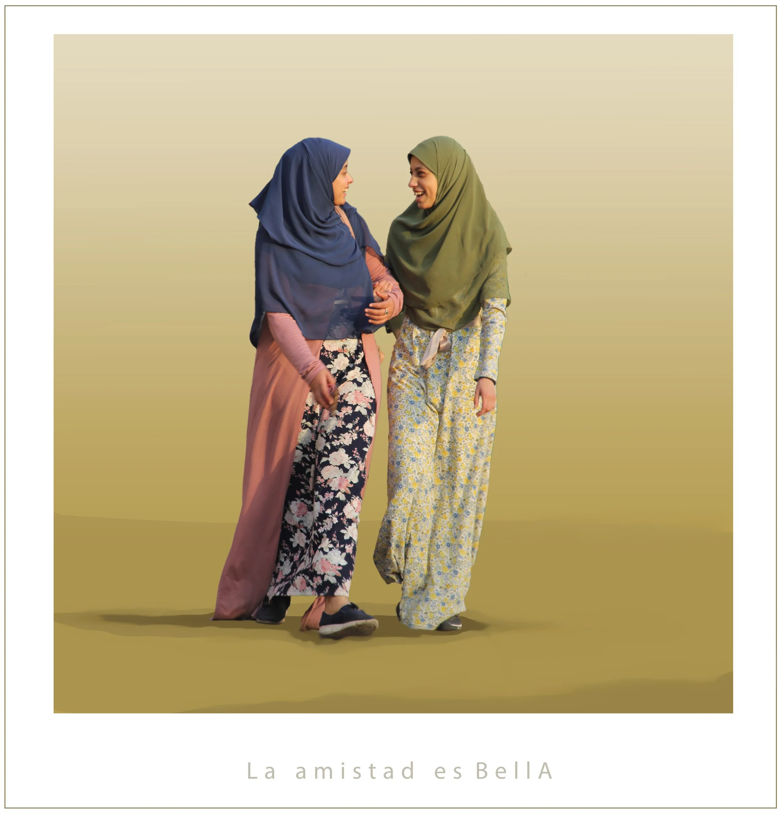 Two women wearing hijabs and comfortable clothing hug and smile at each other against a beige background.