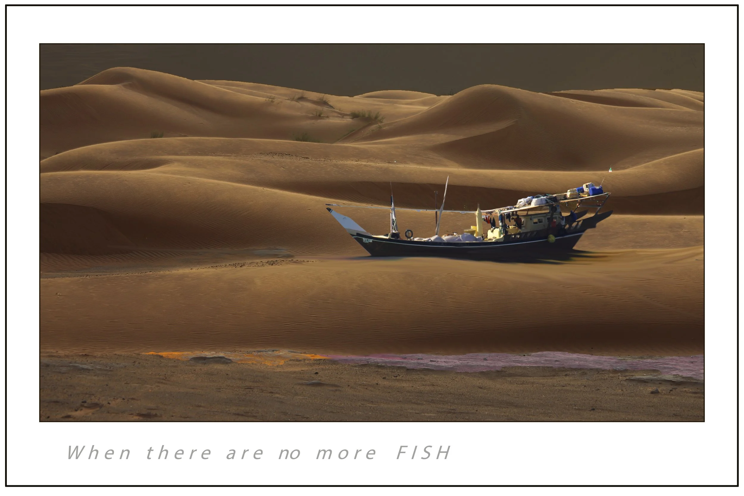 Desert landscape with rolling sand dunes and a boat stranded in the sand.