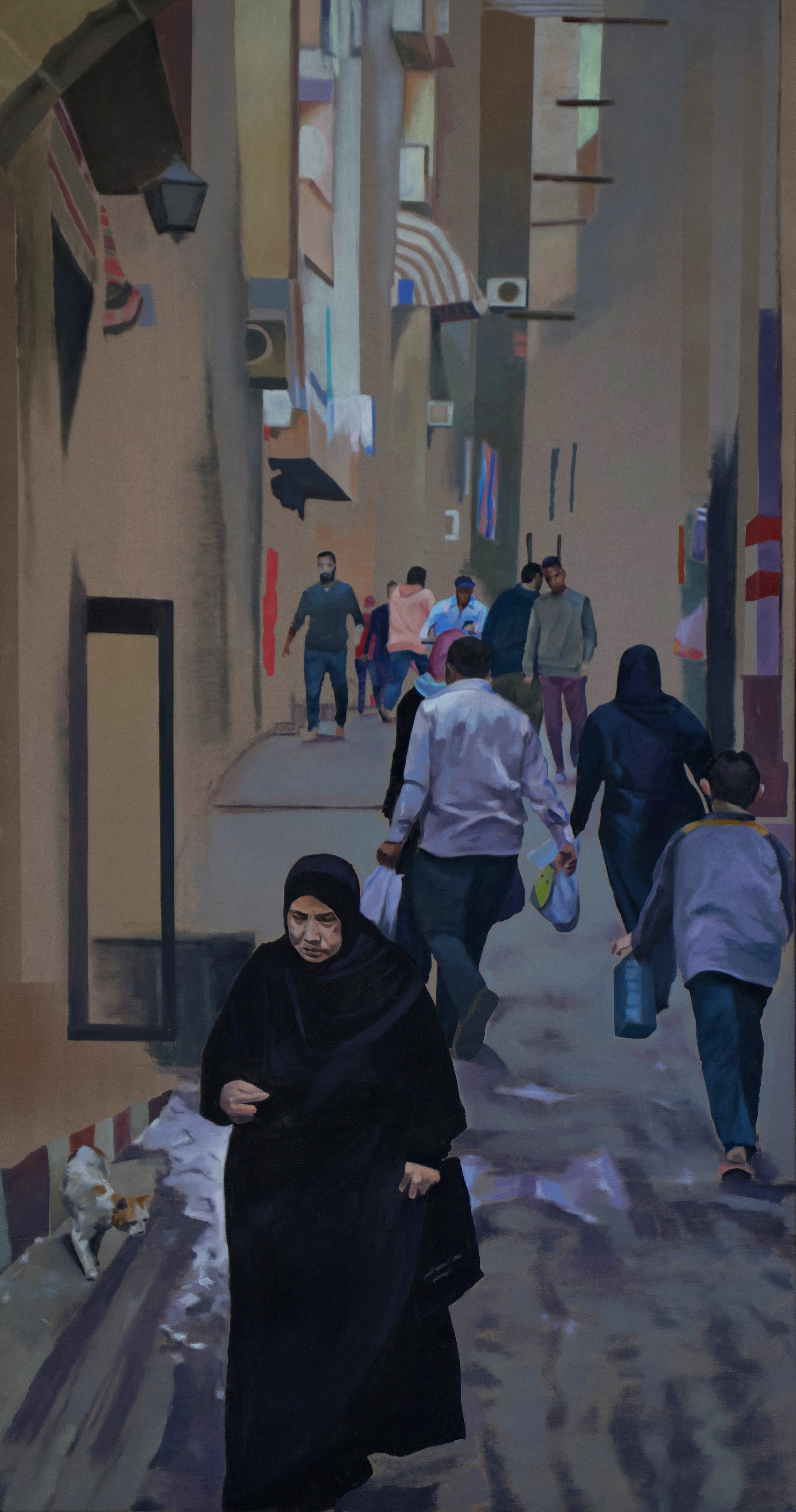 The flow of figures in Cairo's backstreet.
