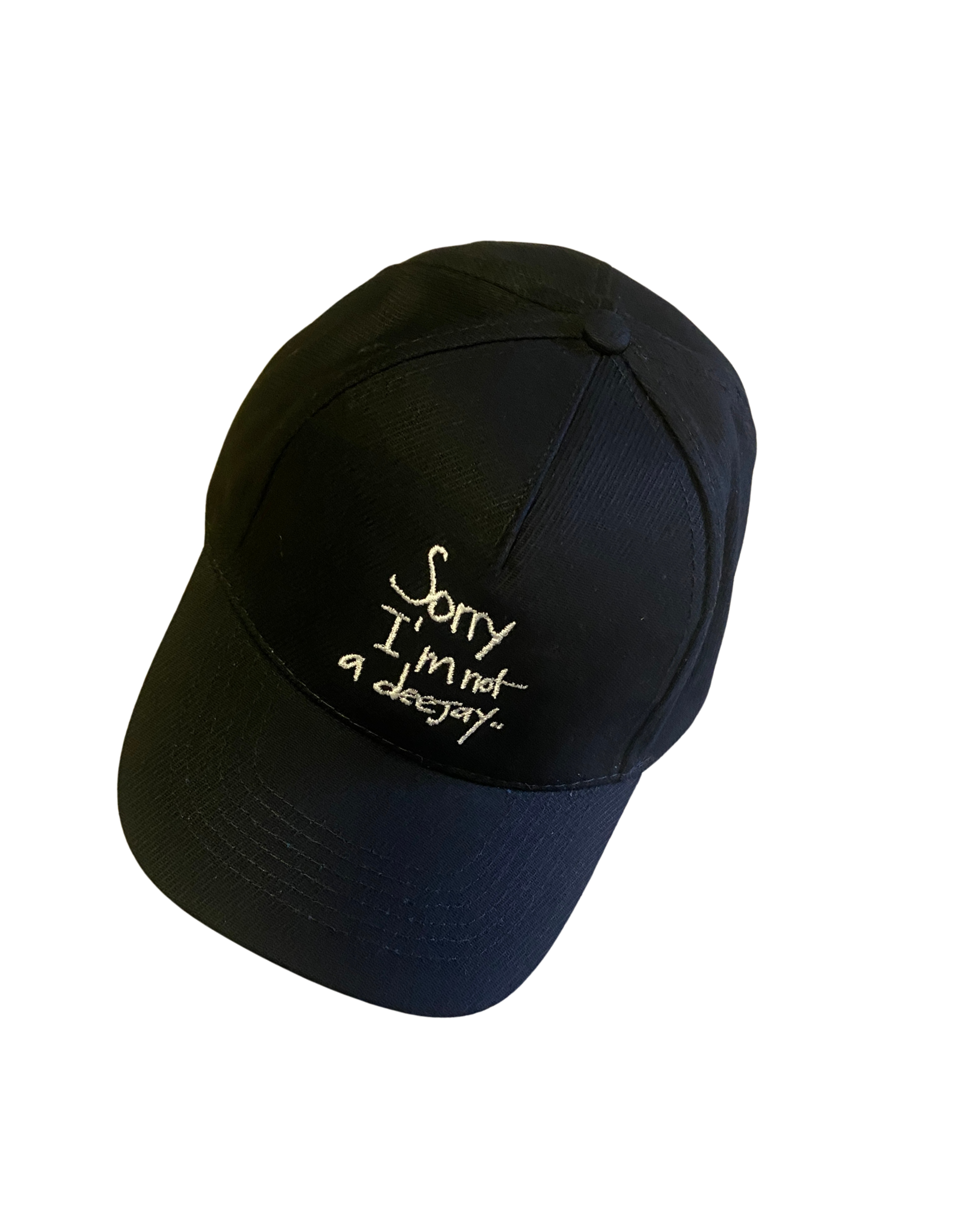 Black baseball cap with white embroidery that reads "Sorry I’m not a devgy"