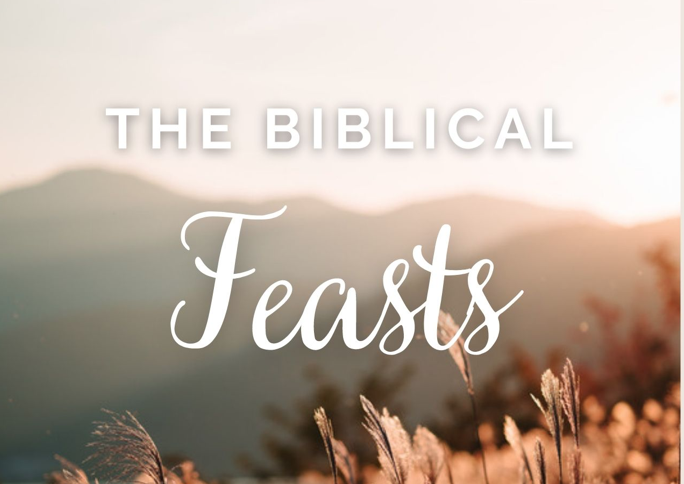 Sunset over hills with tall grass in foreground and text 'The Biblical Feasts' in the center.