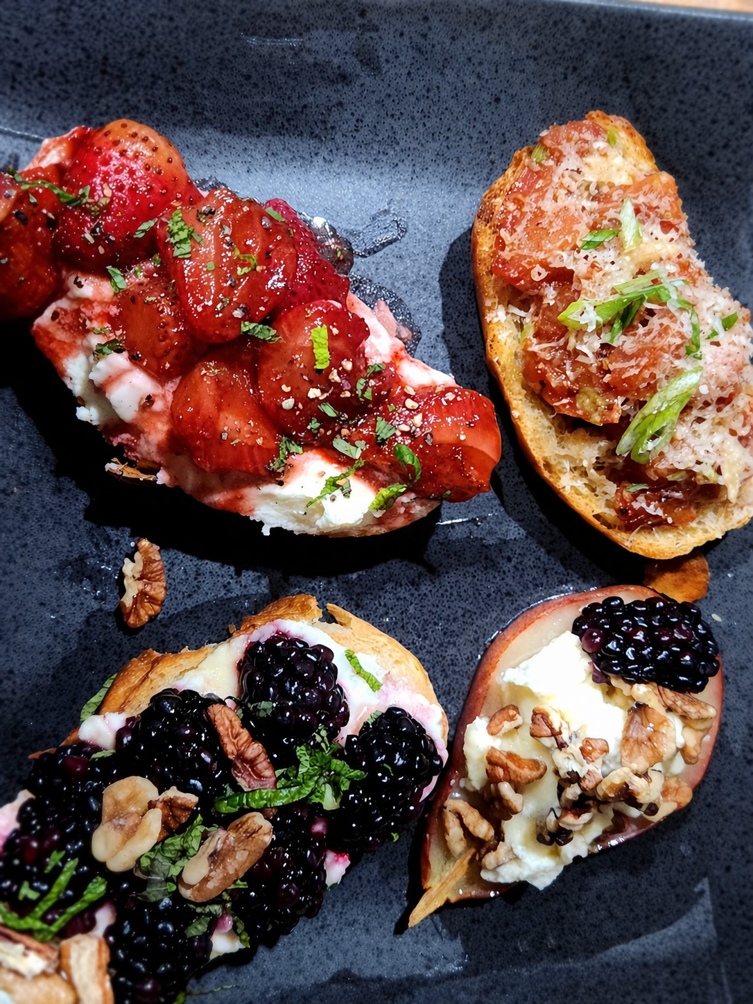 Artisan crostini platter with fresh toppings.png
