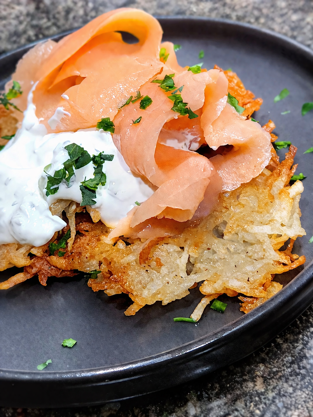Crispy potato rosti with smoked salmon.png