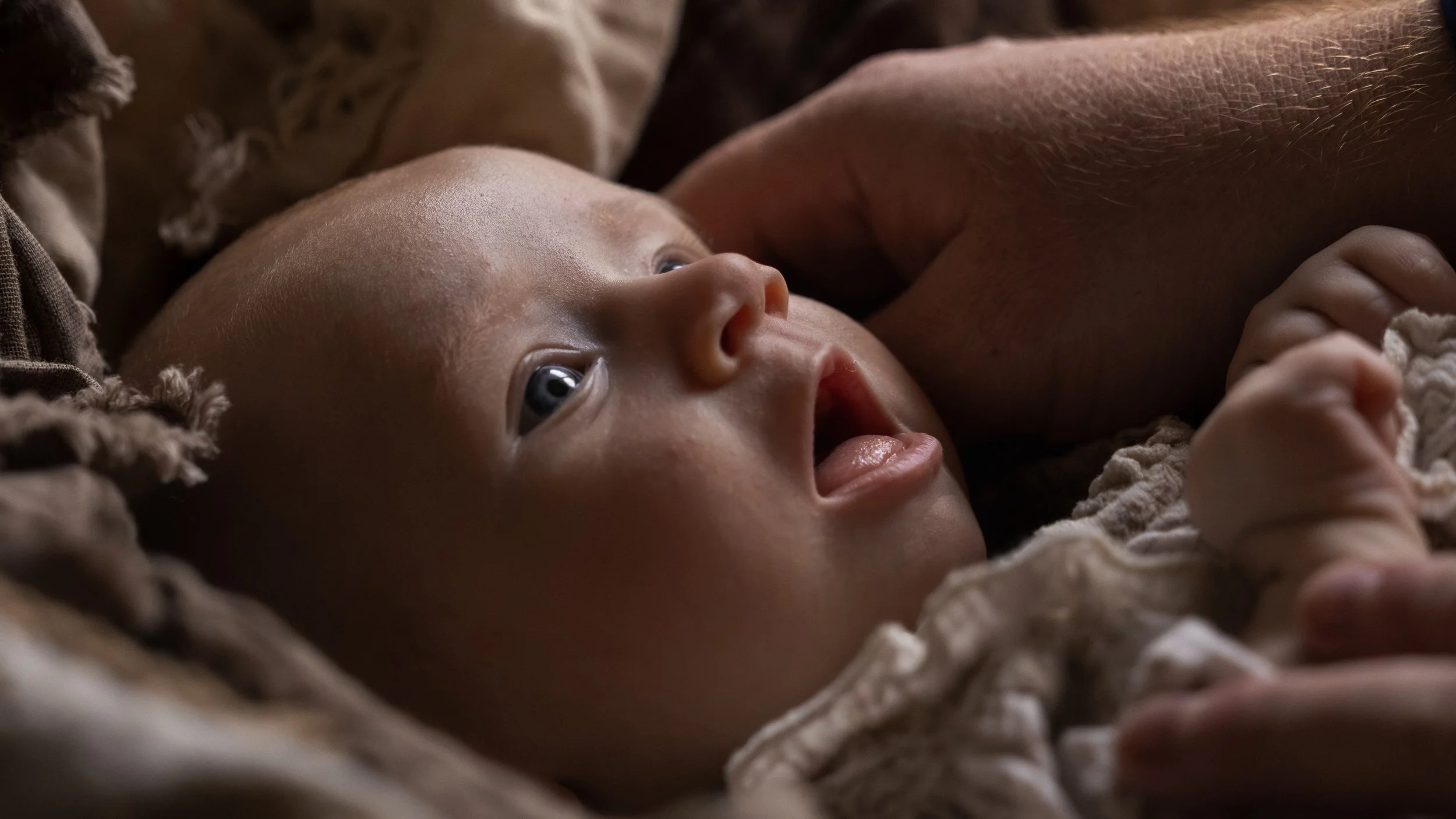 Close-up portrait of a newborn baby during an Adelaide newborn photography session.