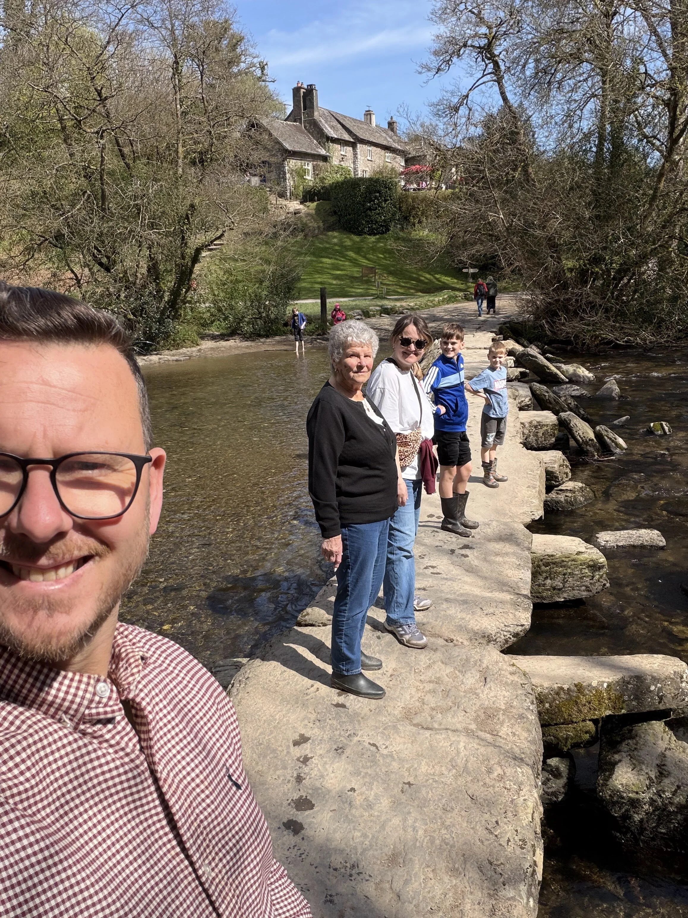 image of our founder David with his family on Tarr Steps
