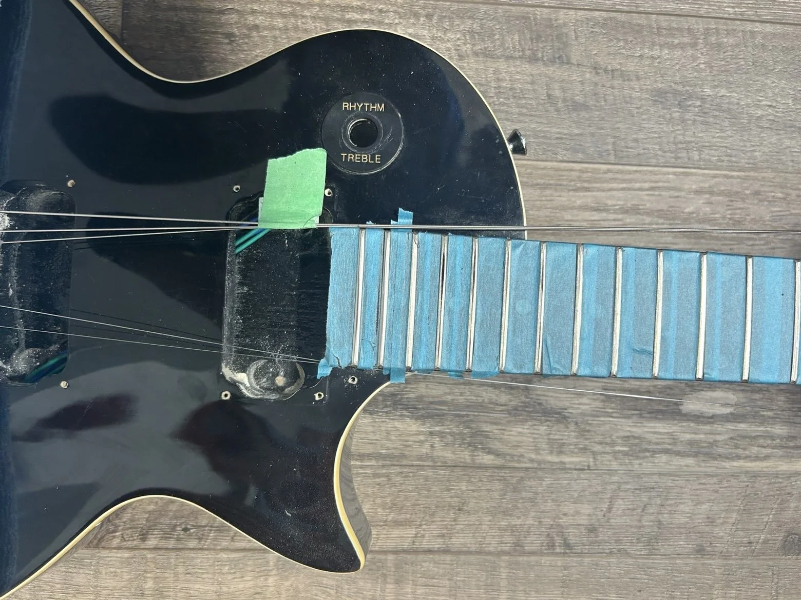 Close-up fret leveling job.
