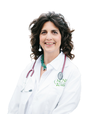 Dr. Jenny Tufenkian, Licensed Naturopathic Physician, smiling wearing a white lab coat and a stethoscope around her neck