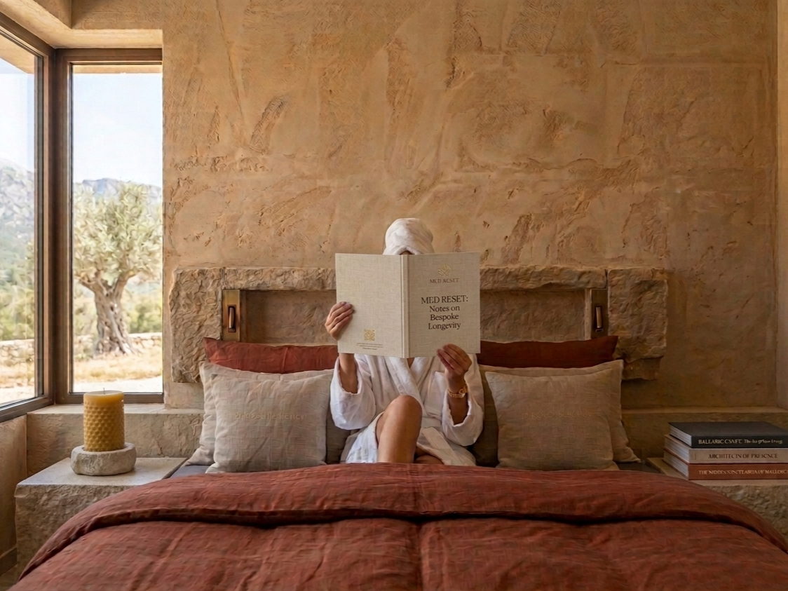 Woman reading at a longevity retreat in Mallorca