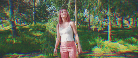gif of a pink haired girl lost in the forest