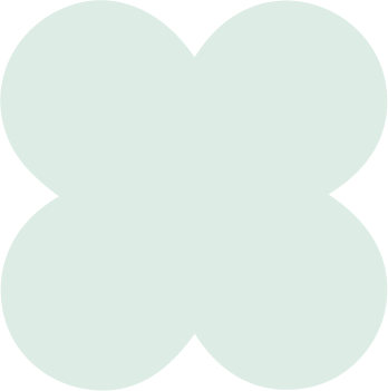 Four light green overlapping circles arranged in a cloverleaf pattern.