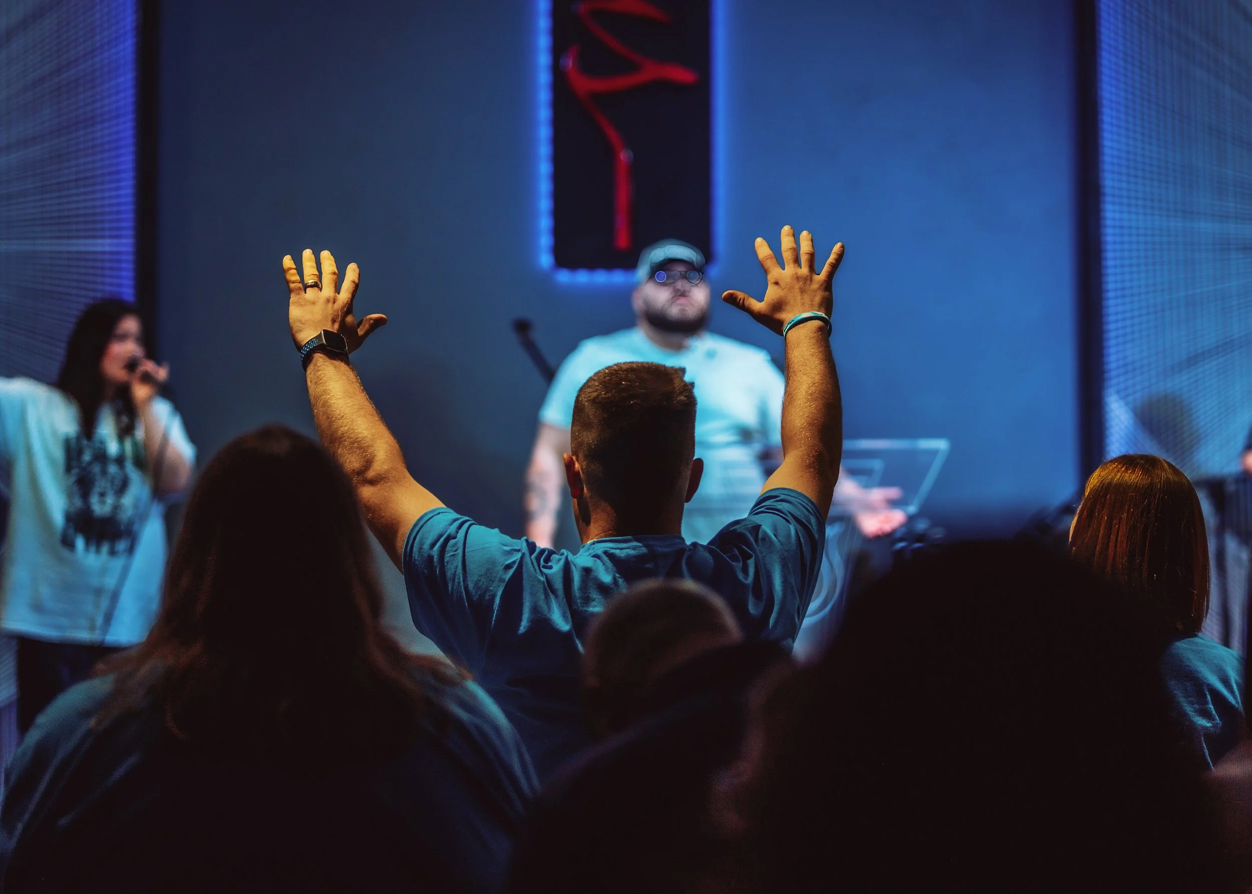 Congregation member worshipping at a Breakthrough worship night.
