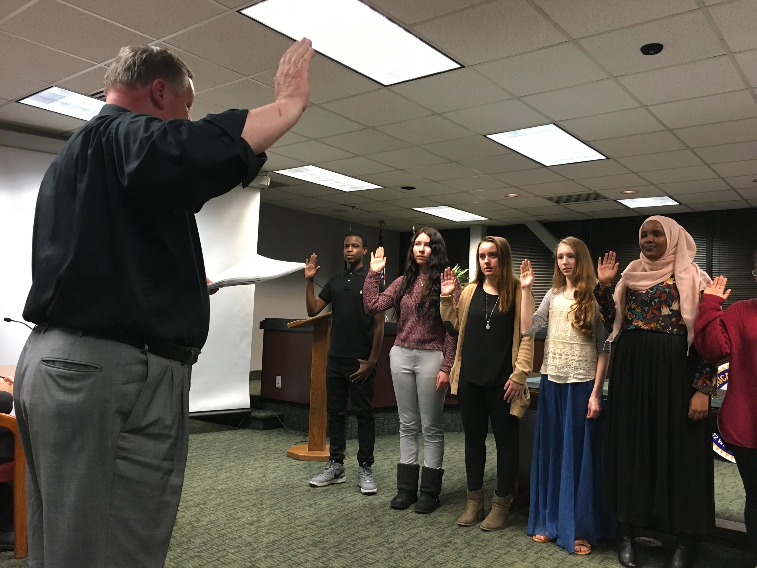 Kids being sworn into the Youth City Council