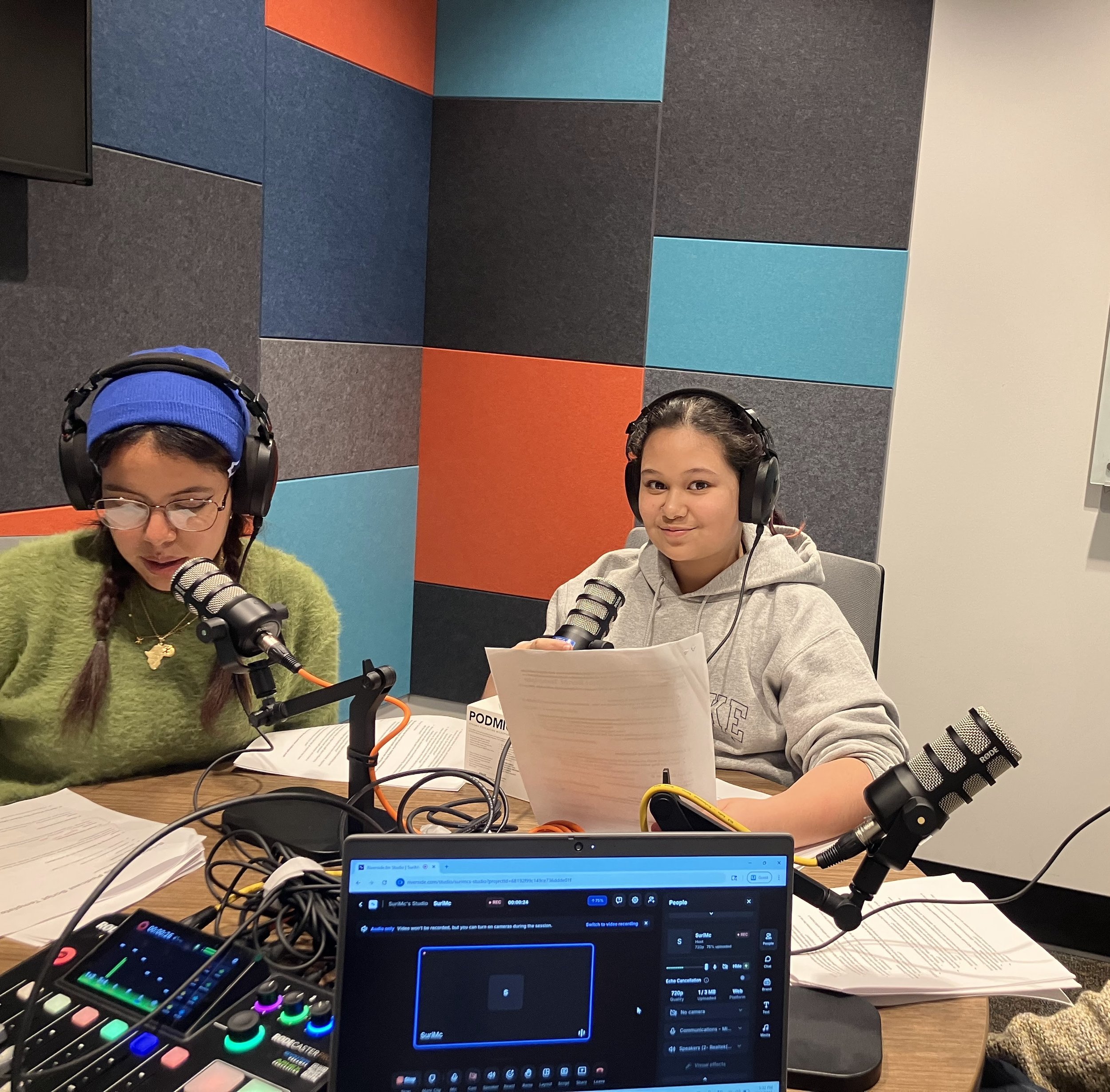 Kids recording a podcast