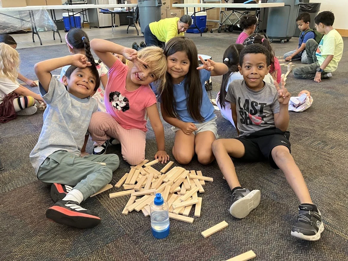 Kids playing with building blocks.