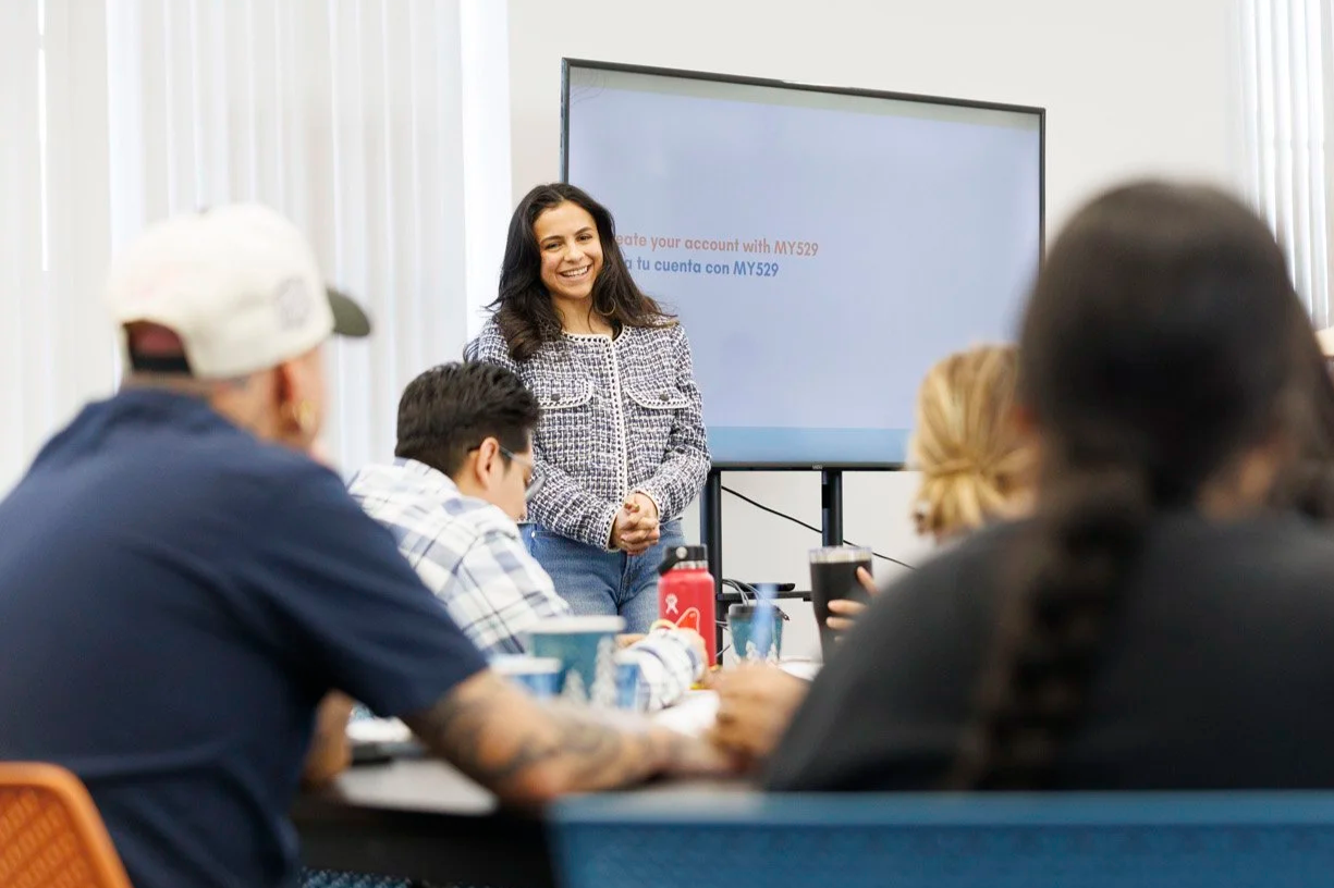 Presenter leading a parenting class to a group
