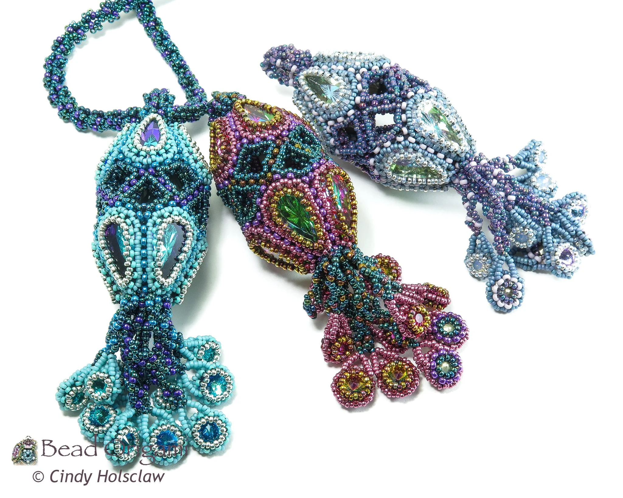 Colorful beaded jewelry including necklaces and earrings arranged on a white background.